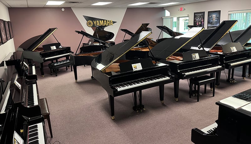 Showroom pictures of new and used pianos available at the Las Vegas Pianos Remodeling Sale
