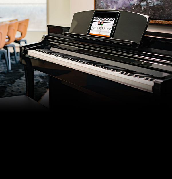 Digital piano with a touchscreen display, polished ebony finish, available at Las Vegas Pianos for premium sound quality.