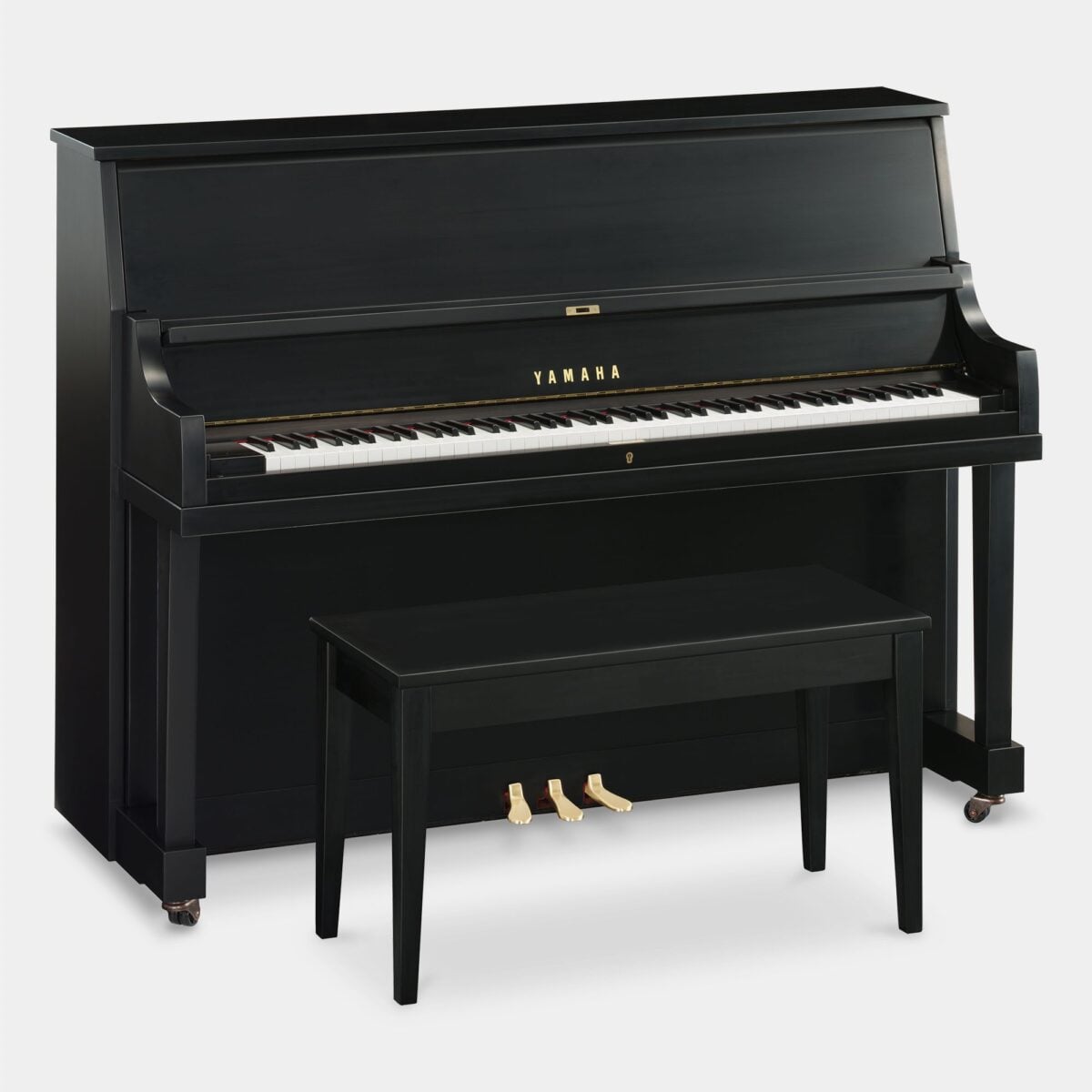 Yamaha b2 upright piano in polished ebony finish with matching bench, showcasing premium build and craftsmanship.