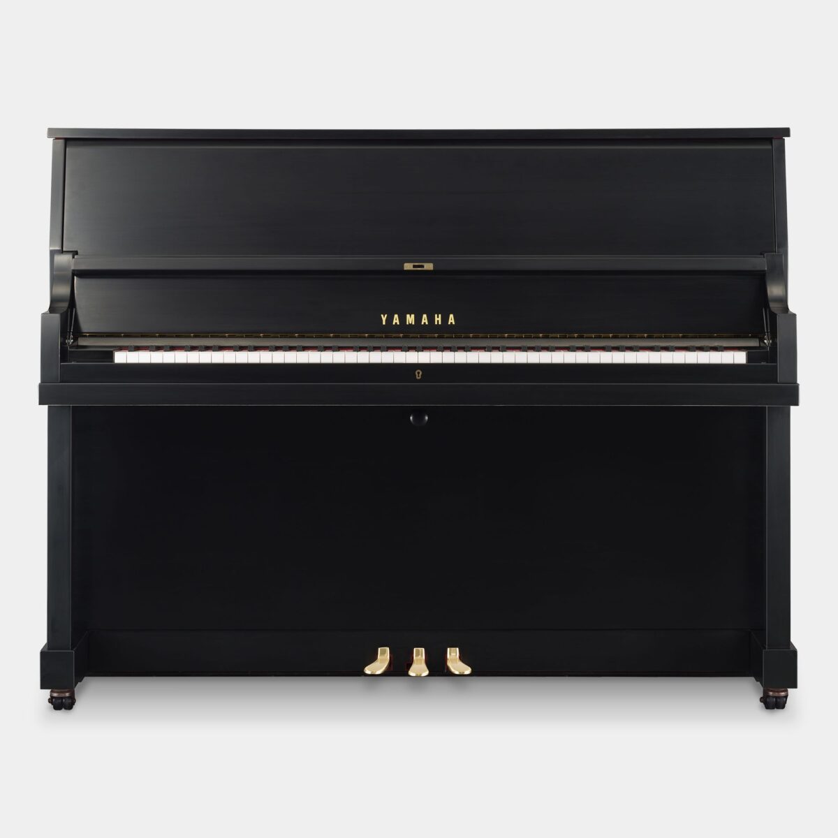 Yamaha upright piano in polished ebony finish, showcasing premium craftsmanship. Available at Las Vegas Pianos.
